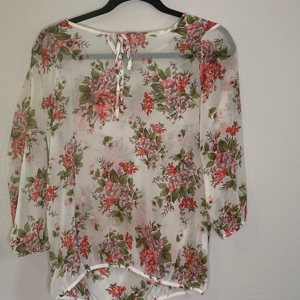 Translucent floral blouse